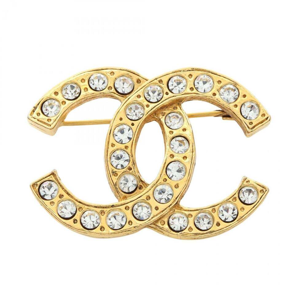 CHANEL White Logo Brooch